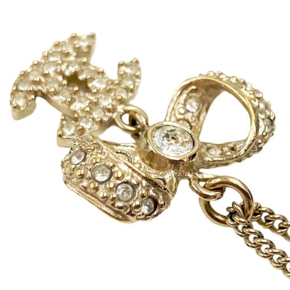 CHANEL Gold Logo Necklace - Picture 4 of 8